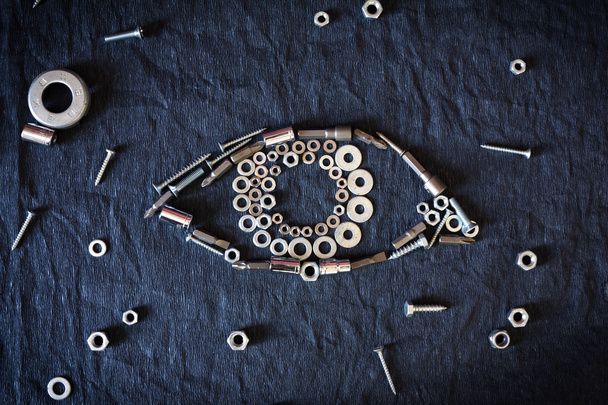 human eye of the nuts and tools - Φωτογραφία, εικόνα