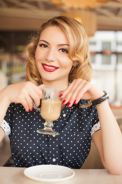 retro beautiful woman in restaurant cafe with coffee - Photo, image