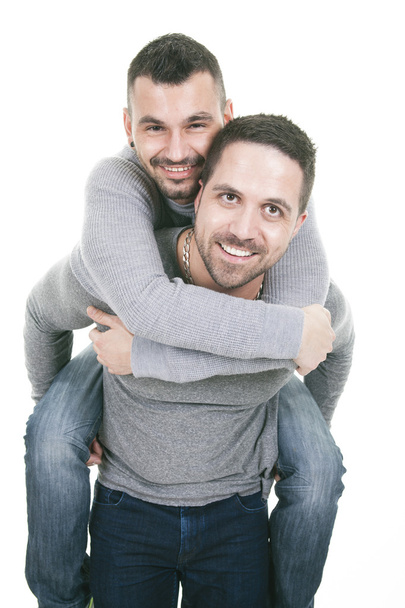 A homosexual couple over a white background - Фото, зображення