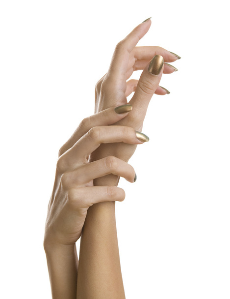 黄金マニキュア、光沢のある黄金の爪のポーランド語の女性の手 - 写真・画像