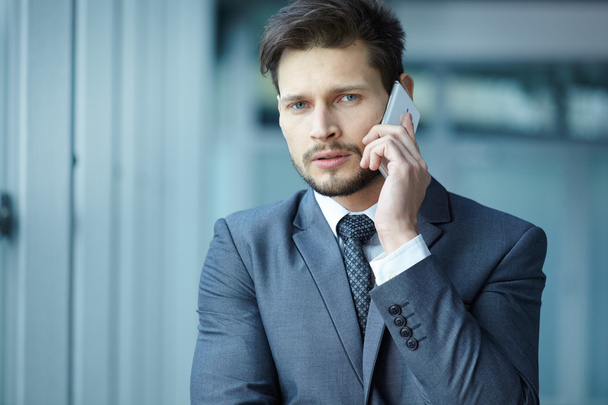 Businessman talking  on phone - Photo, image