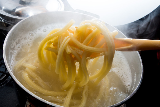 Pasta boiling in pot - Fotó, kép