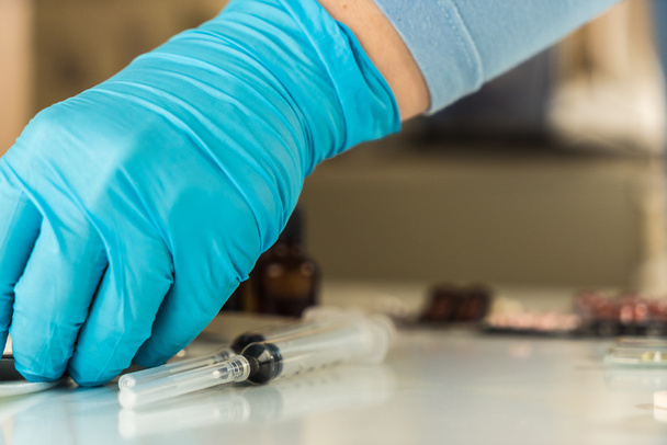 Syringe with glass vials and medications pills drug - Фото, изображение