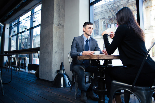 Businesswoman and businessman with coffee in restaurant - Zdjęcie, obraz