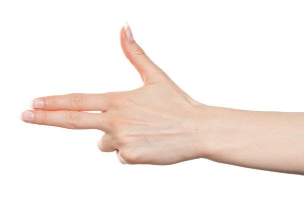 Mulher mão arma gesto
 - Foto, Imagem