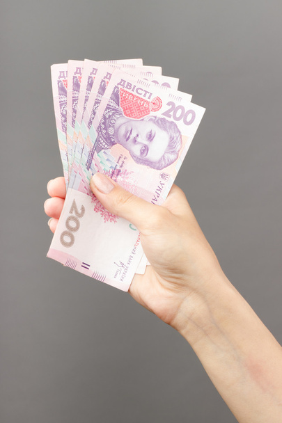 female hand holding money - Foto, imagen