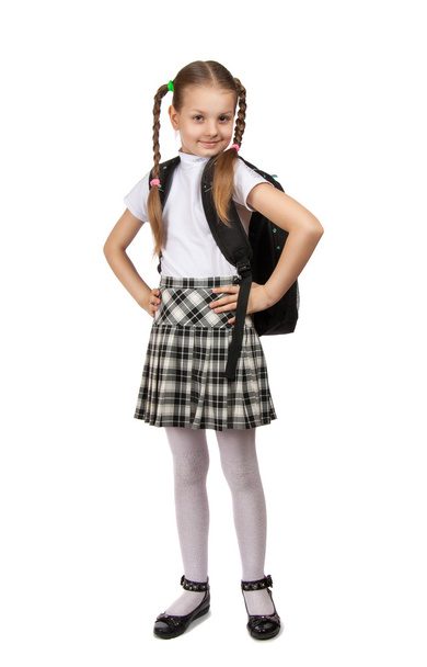 girl in school uniform with books  - Фото, изображение