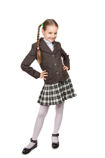 beautiful little girl in school uniform with books - Fotó, kép