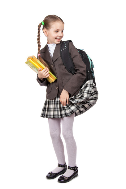 beautiful girl  with books . girl looking back - Фото, изображение