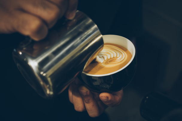 Cup of Coffee in coffee shop vintage color tone style - Foto, Bild
