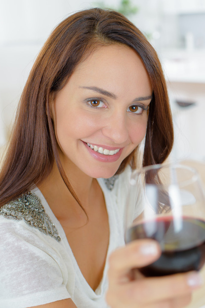 Having a glass of wine at home - Zdjęcie, obraz