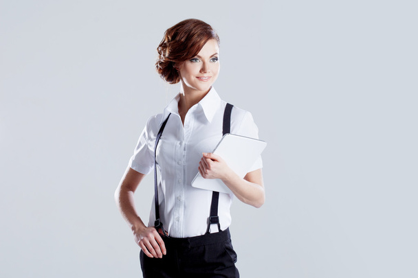 Successful business woman, on white background, with laptop in hand - Fotografie, Obrázek