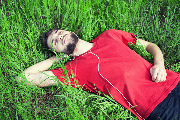 Boy in a grass - Zdjęcie, obraz
