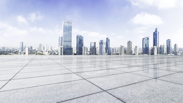 Empty floor with modern skyline and buildings - Photo, Image