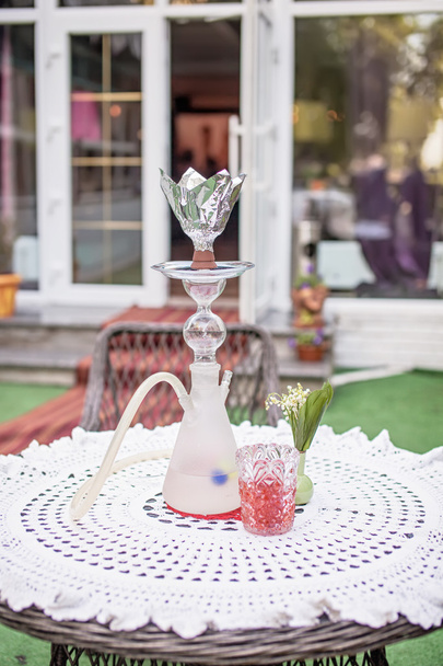 Close-up photo of hookah with tube - 写真・画像