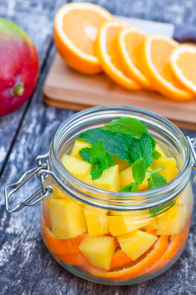 	homemade fruit drink with mango orange and mint - Foto, immagini