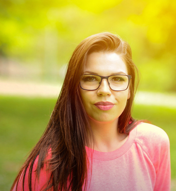 Portrait charming young woman glasses smiling background summer  - Photo, image