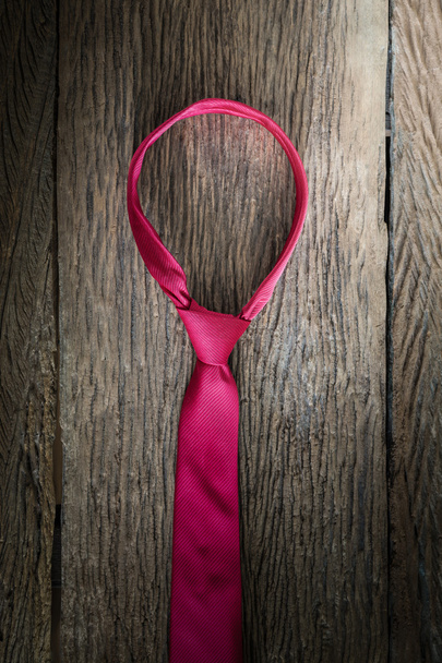 red necktie on wooden table - Photo, Image