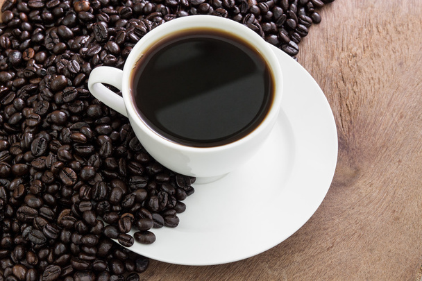 Kaffeetasse mit Bohnen  - Foto, Bild