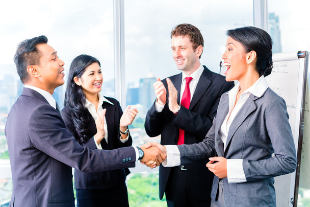 Asian Businesspeople shaking hands - Photo, Image