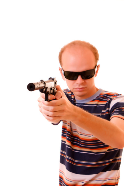 Young man aiming with gun isolated - Φωτογραφία, εικόνα