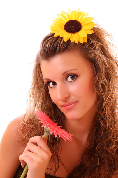 Happy woman with sunflower in hair isolated on white - 写真・画像