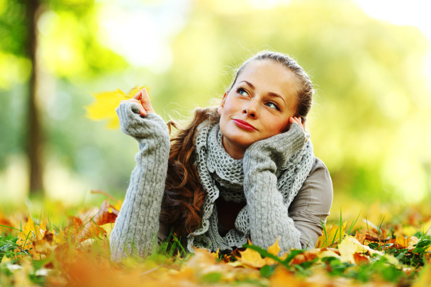 Woman portret in autumn leaf - Photo, Image