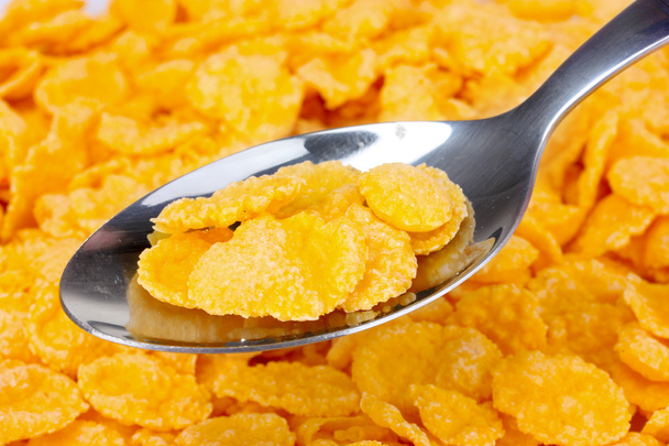 Tasty cornflakes in spoon - Photo, image