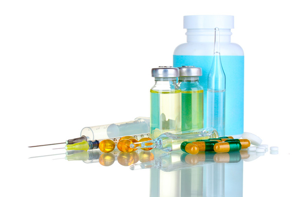 Медицинские бутылки, ампулы, шприц и таблетки
 - Фото, изображение