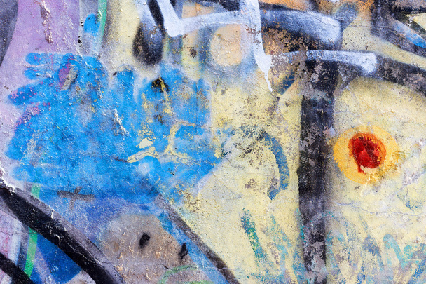 Hooligan smeared paint the walls of the old building. Landscape  - 写真・画像