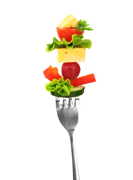 Snack of vegetables on fork - Photo, Image