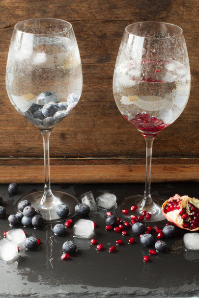 drink with blueberries and pomegranate groceries  - Foto, immagini