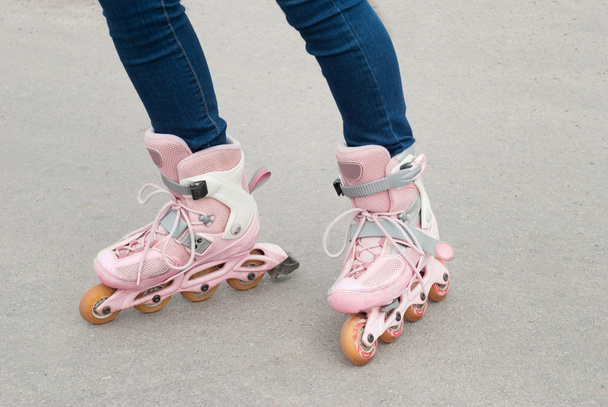 Teenager on roller skates. - 写真・画像