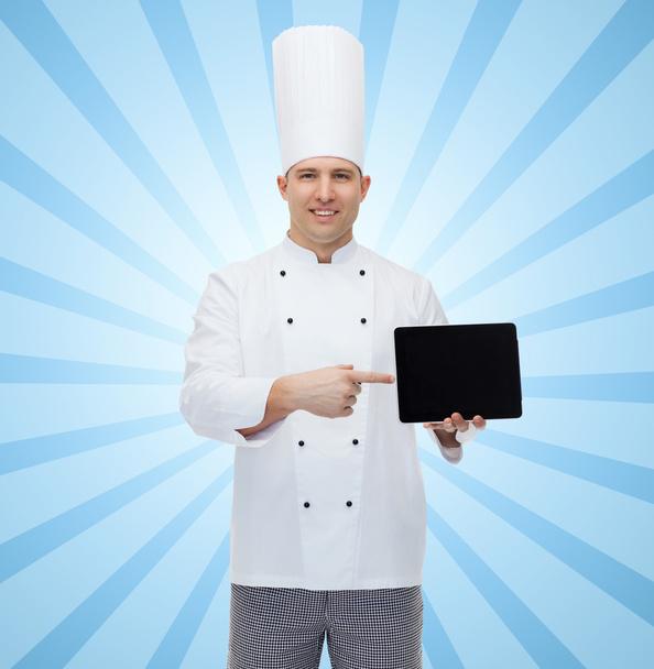 happy male chef cook showing with tablet pc - Foto, afbeelding