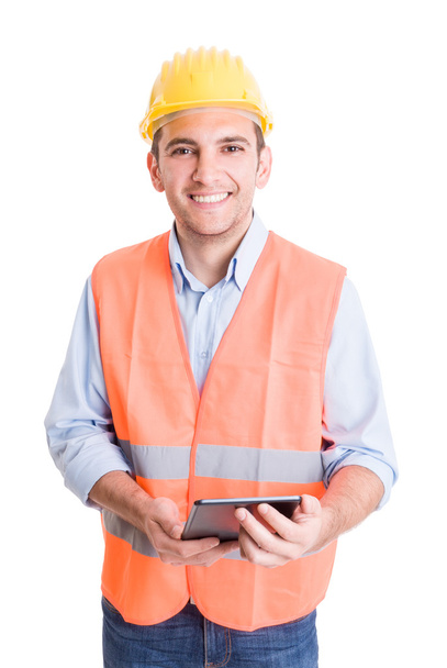 Modern and confident engineer holding tablet - Foto, imagen