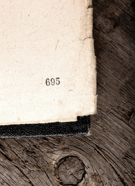Old shabby book apened on obsolete wood background - Photo, Image