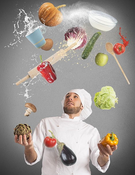 Koch jongliert beim Kochen - Foto, Bild