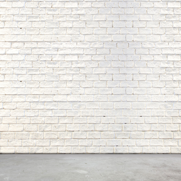 Стена из белого кирпича и цементный пол
 - Фото, изображение