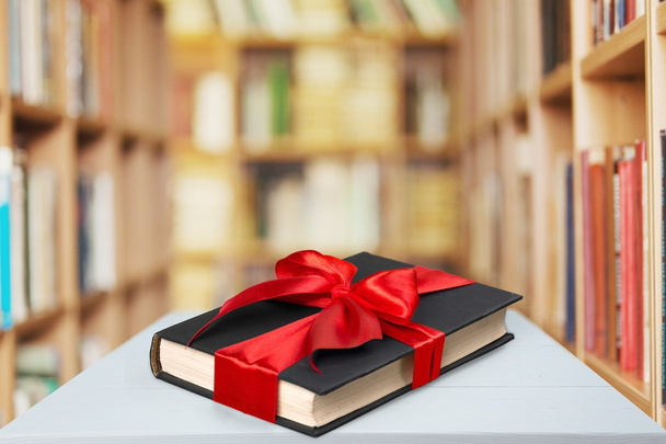 Book, gift, bow. - Foto, Imagen