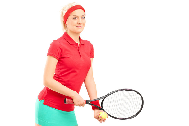 Female tennis player preparing to serve - Foto, imagen