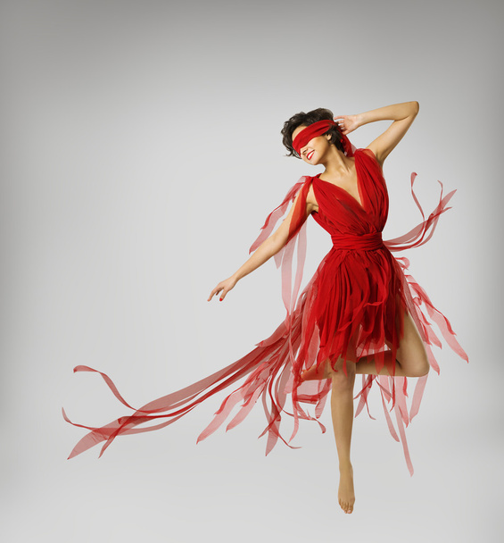 Woman Artist Dancing in Red Dress, Girl with Band on Eyes,  Model with Ribbon Bandage - 写真・画像