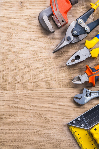 Set  of working tools on wooden board - Foto, Imagen