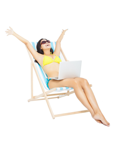 young woman in bikini sitting with laptop - Fotoğraf, Görsel