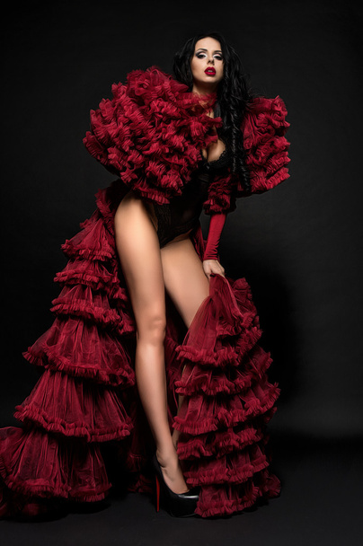 Woman in  underclothes and red  bolero - Фото, изображение