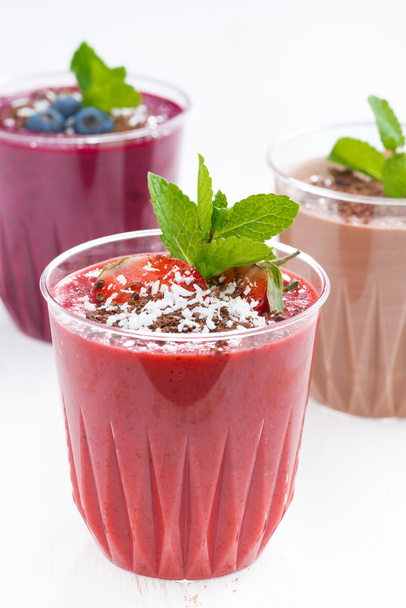 Strawberry, blueberry and chocolate milkshakes, vertical - Zdjęcie, obraz