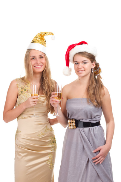 Duas meninas celebram o Natal com presentes e óculos em suas mãos
 - Foto, Imagem