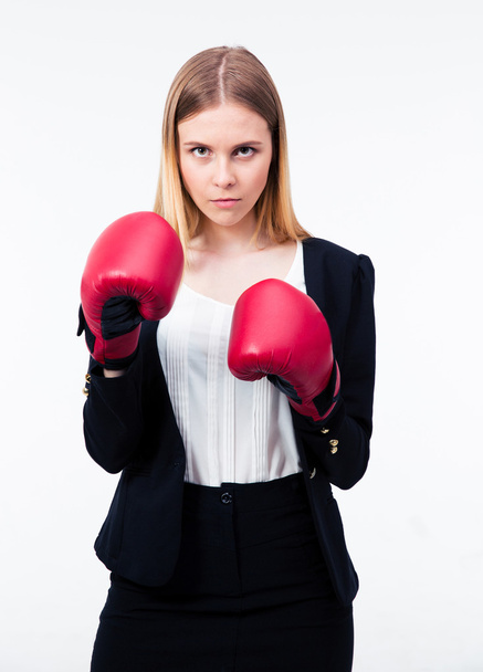 Portrait of a businesswoman in boxing gloves - Photo, image