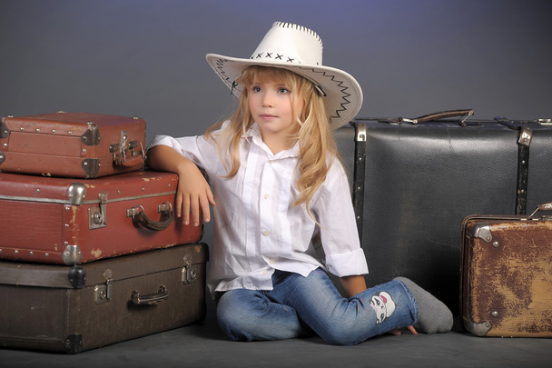Little girl in a white cowboy hat - Фото, зображення