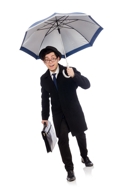 Young man holding suitcase and umbrella isolated on white - Photo, Image