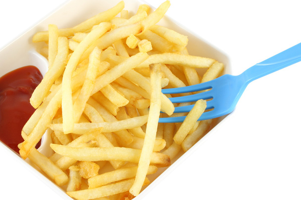 French fries with red ketchup and blue spoon - Photo, Image